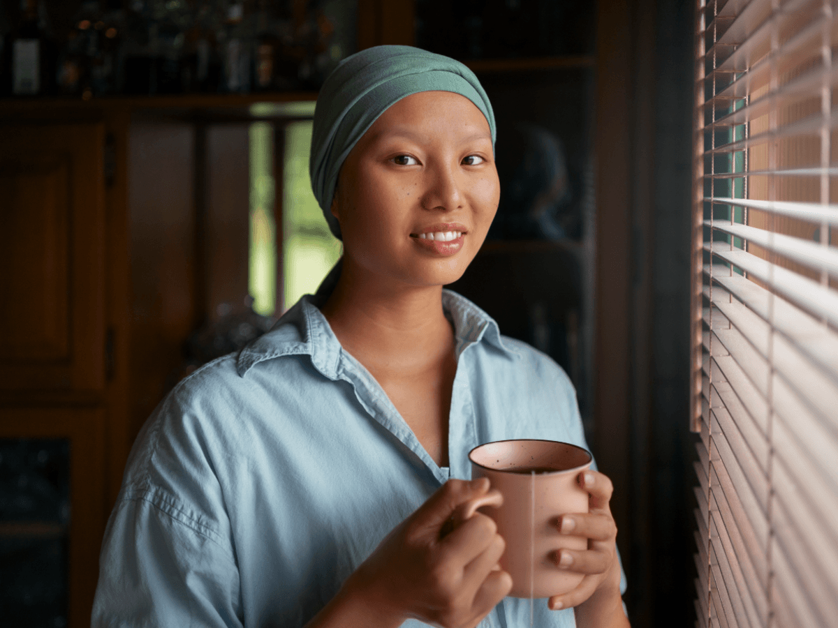 Bilayer Model Balances Privacy And Pan-Cancer Survival